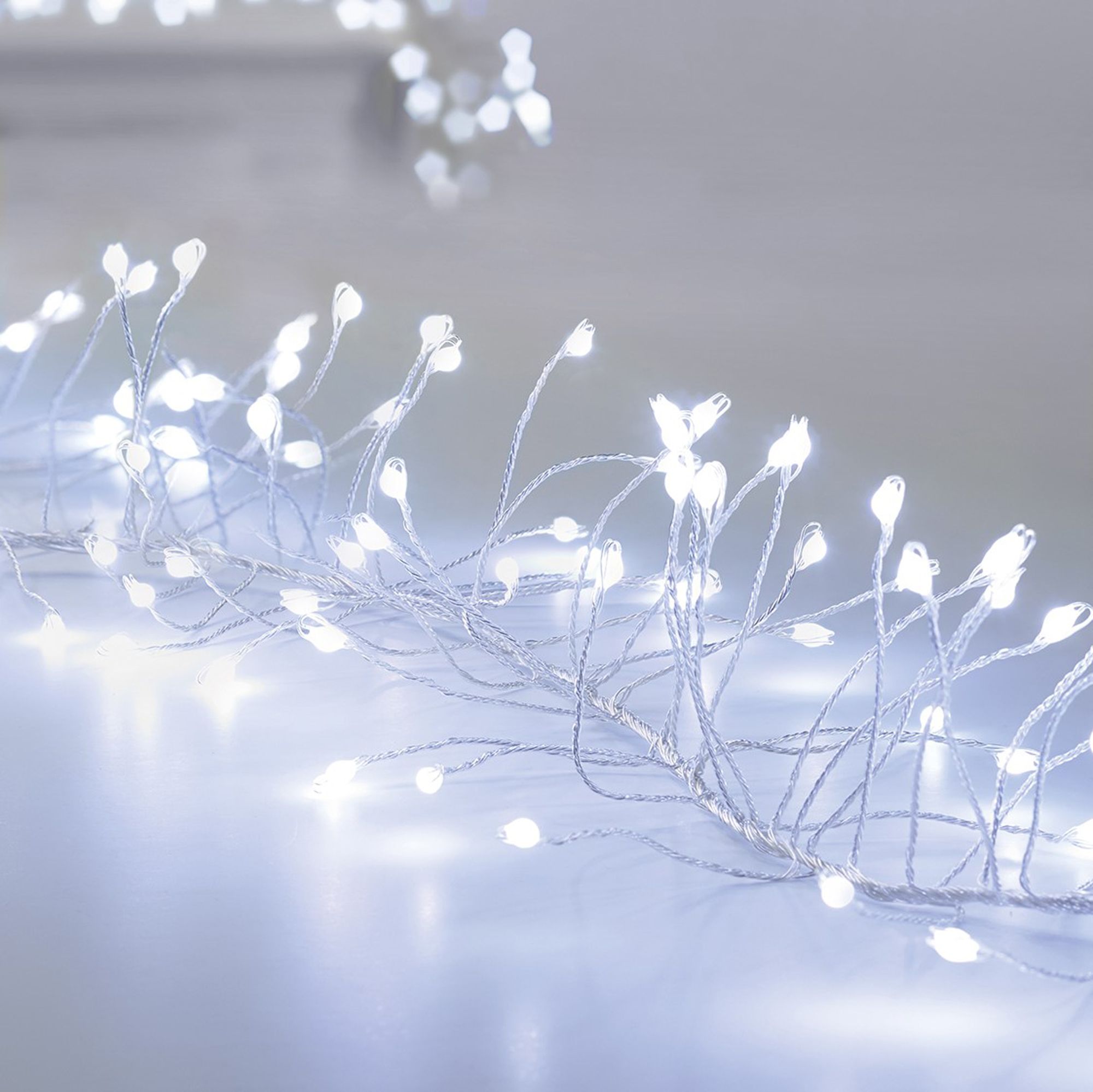 430 White Garland LED Cluster string light with Clear & silver cable