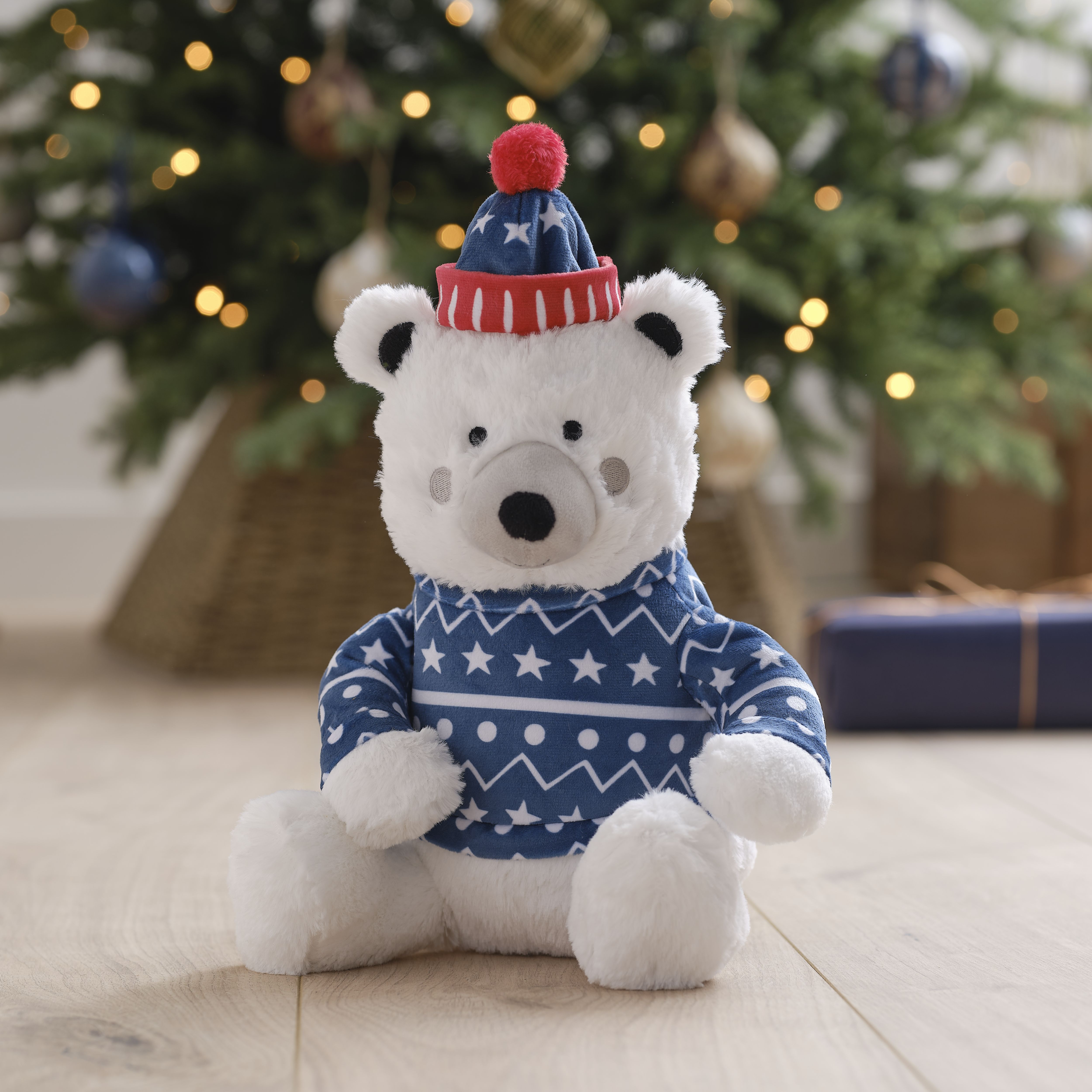 Battery powered Sings turns Multicolour Polar Bear in jumper character