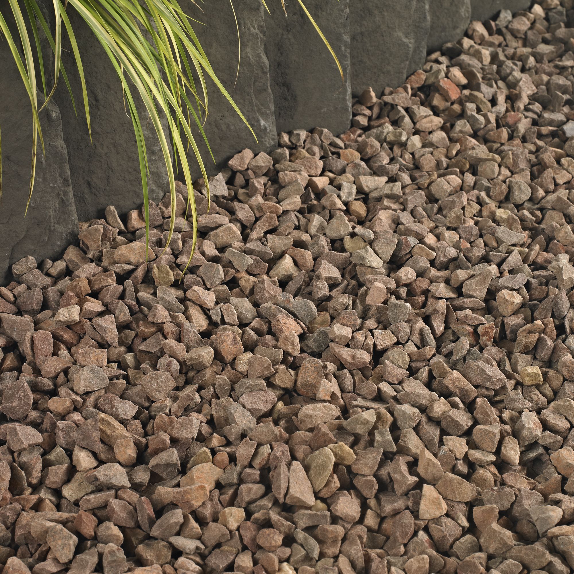 Red stone chippings store bulk bag