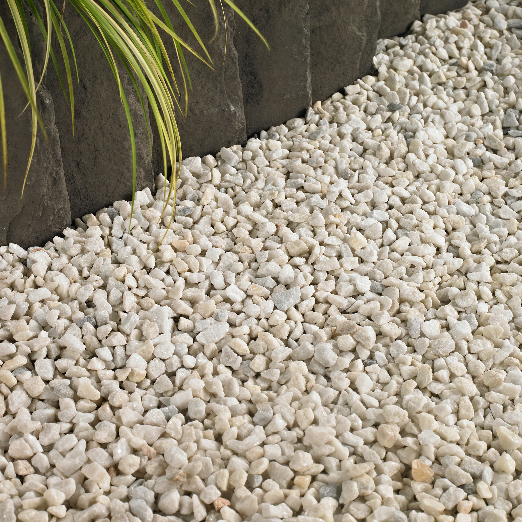 Bags of white store garden stones