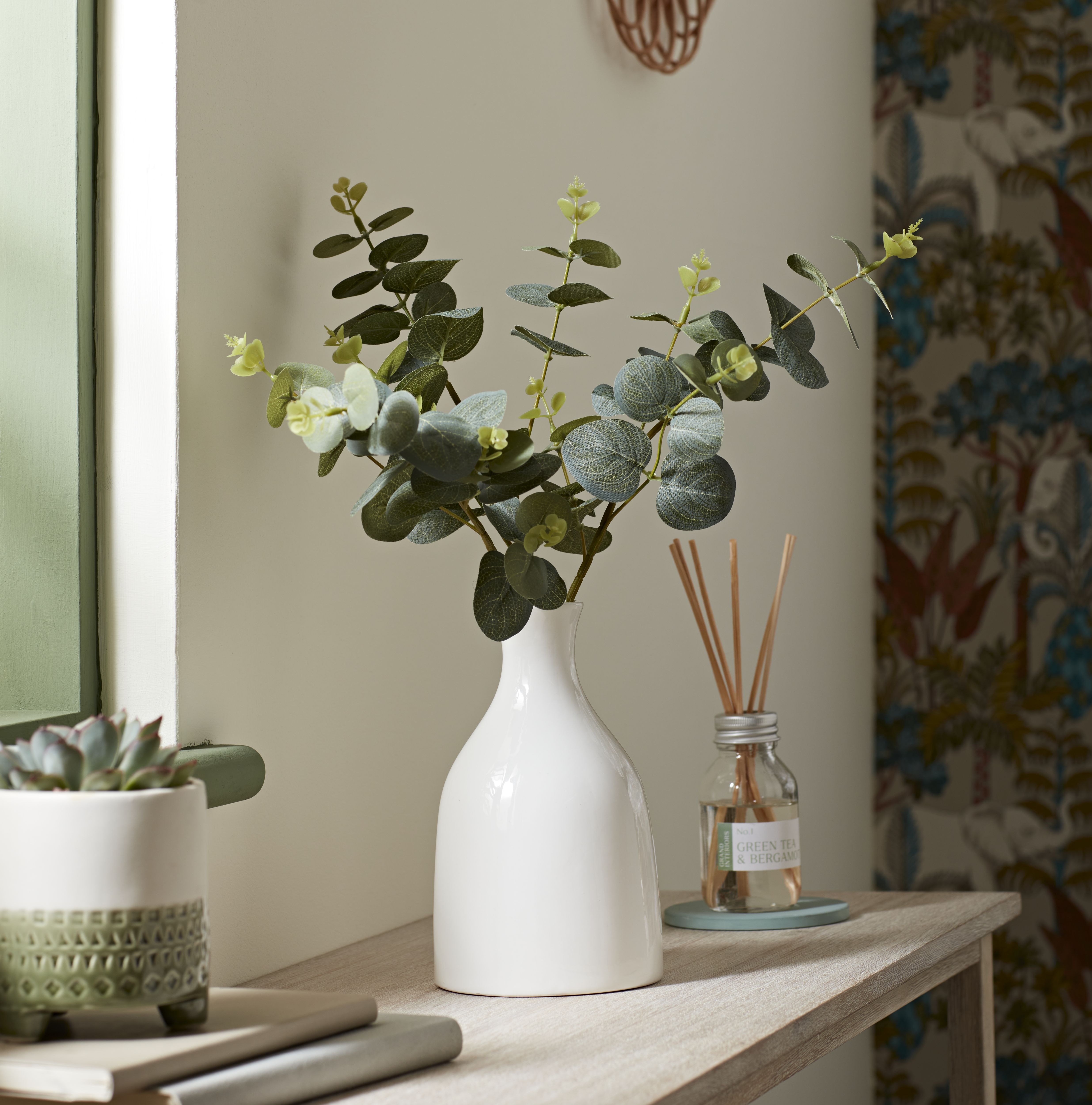 Candlelight Green 25cm Eucalyptus stems Artificial plant in Natural Ceramic Bottle vase