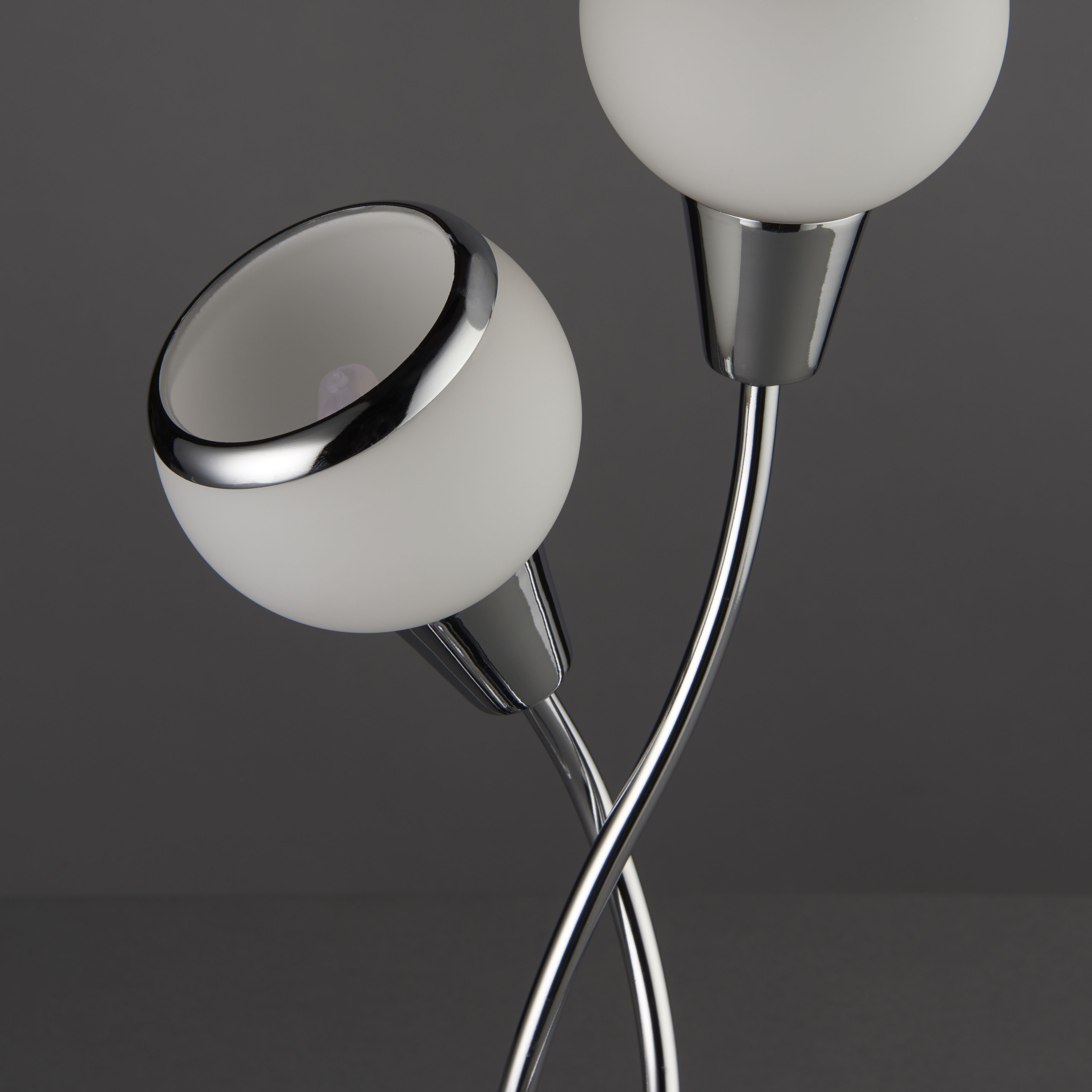 Cherika Swirl Polished Chrome effect Table light