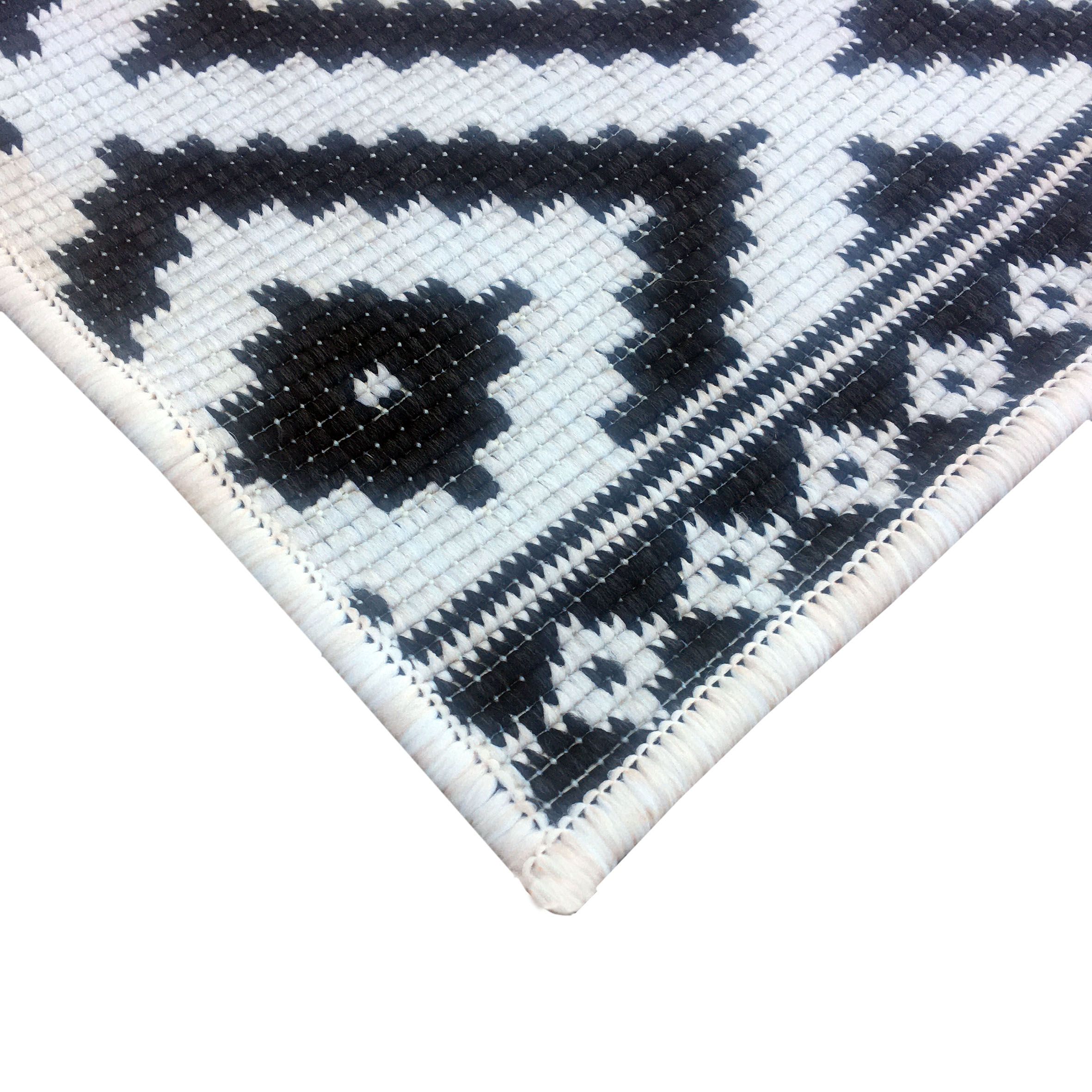 100 % hand loomed Black and White modern large area top rug