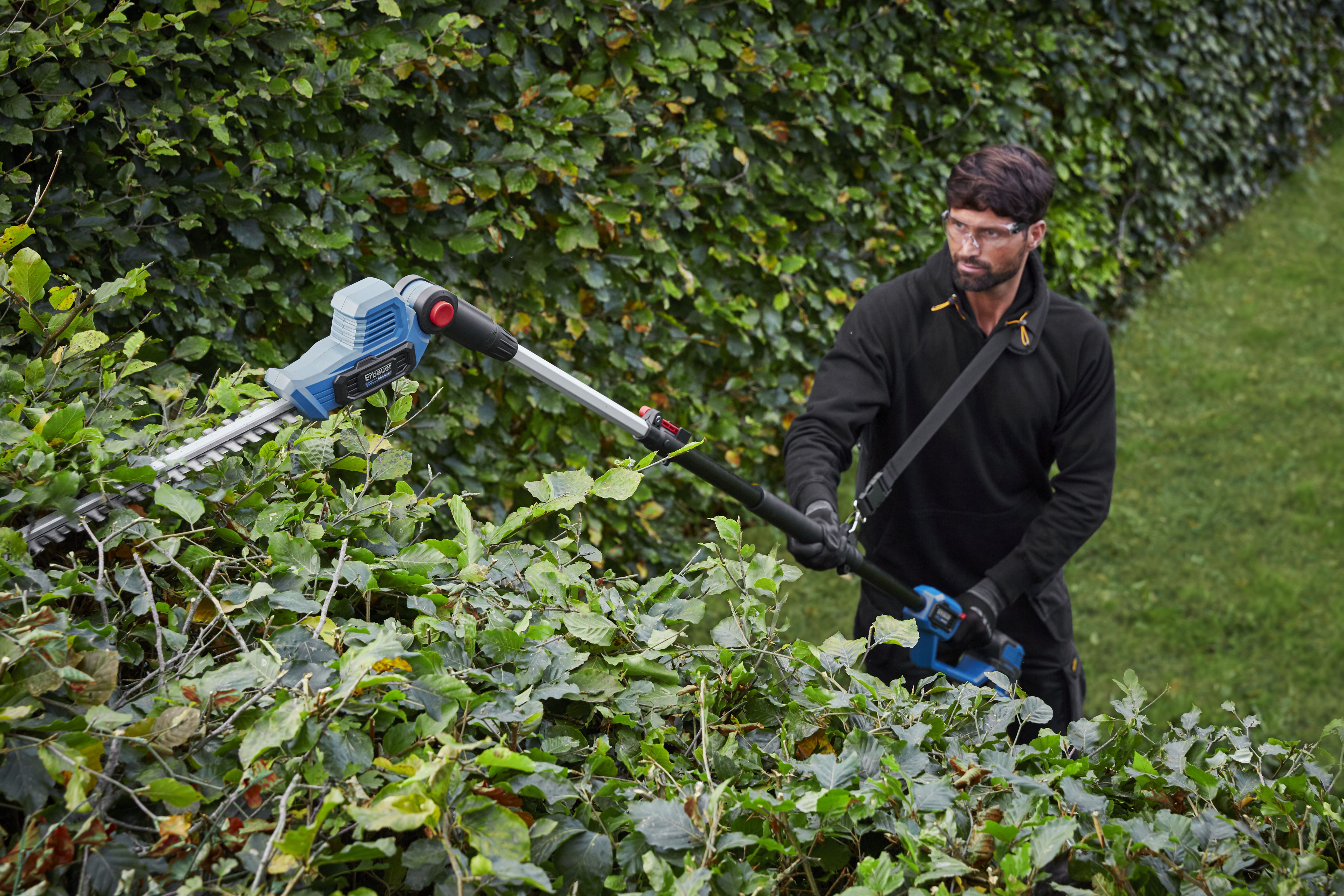 Hedge trimmer for tall outlet hedges