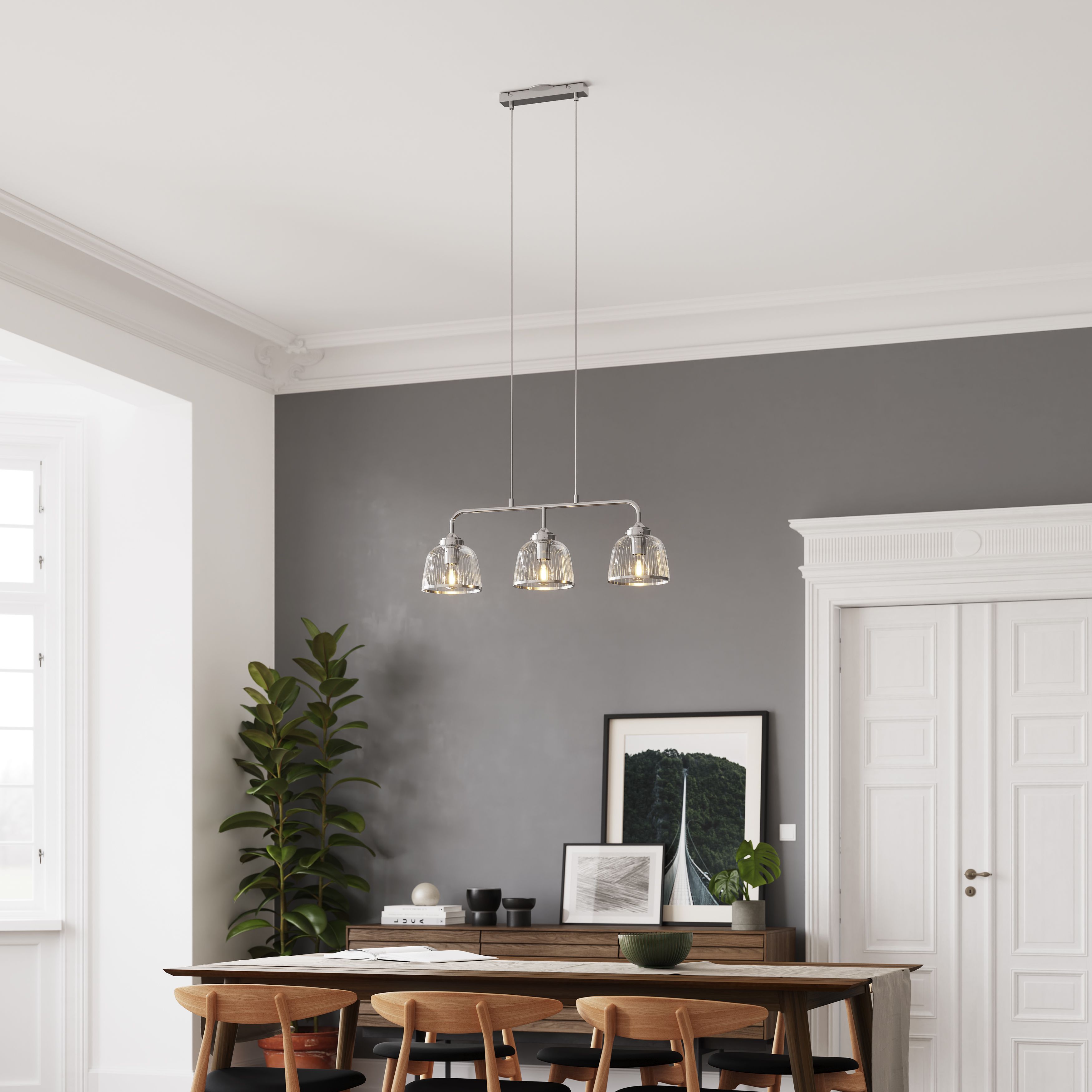 Three pendant lights over deals dining table