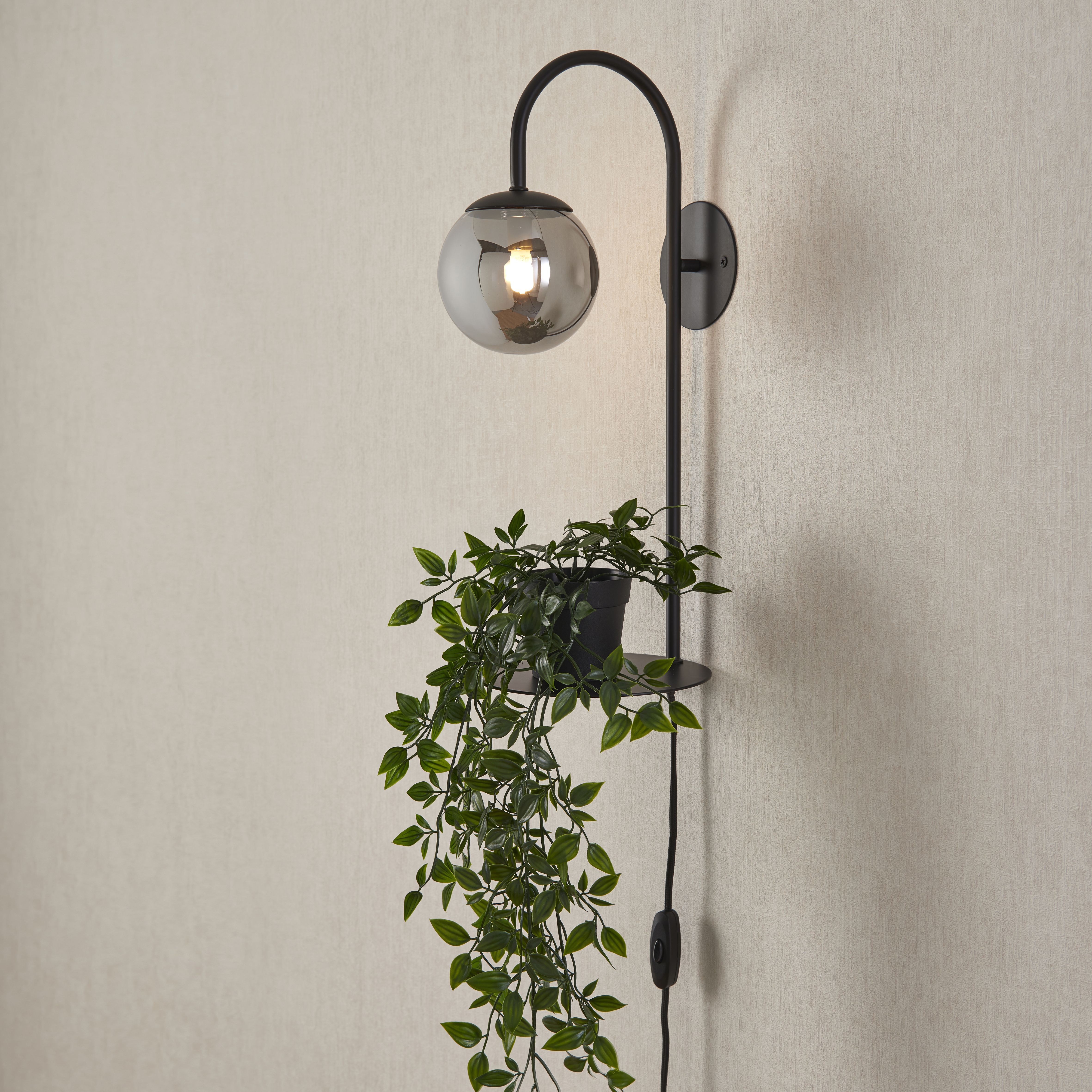 Black plug in store wall light