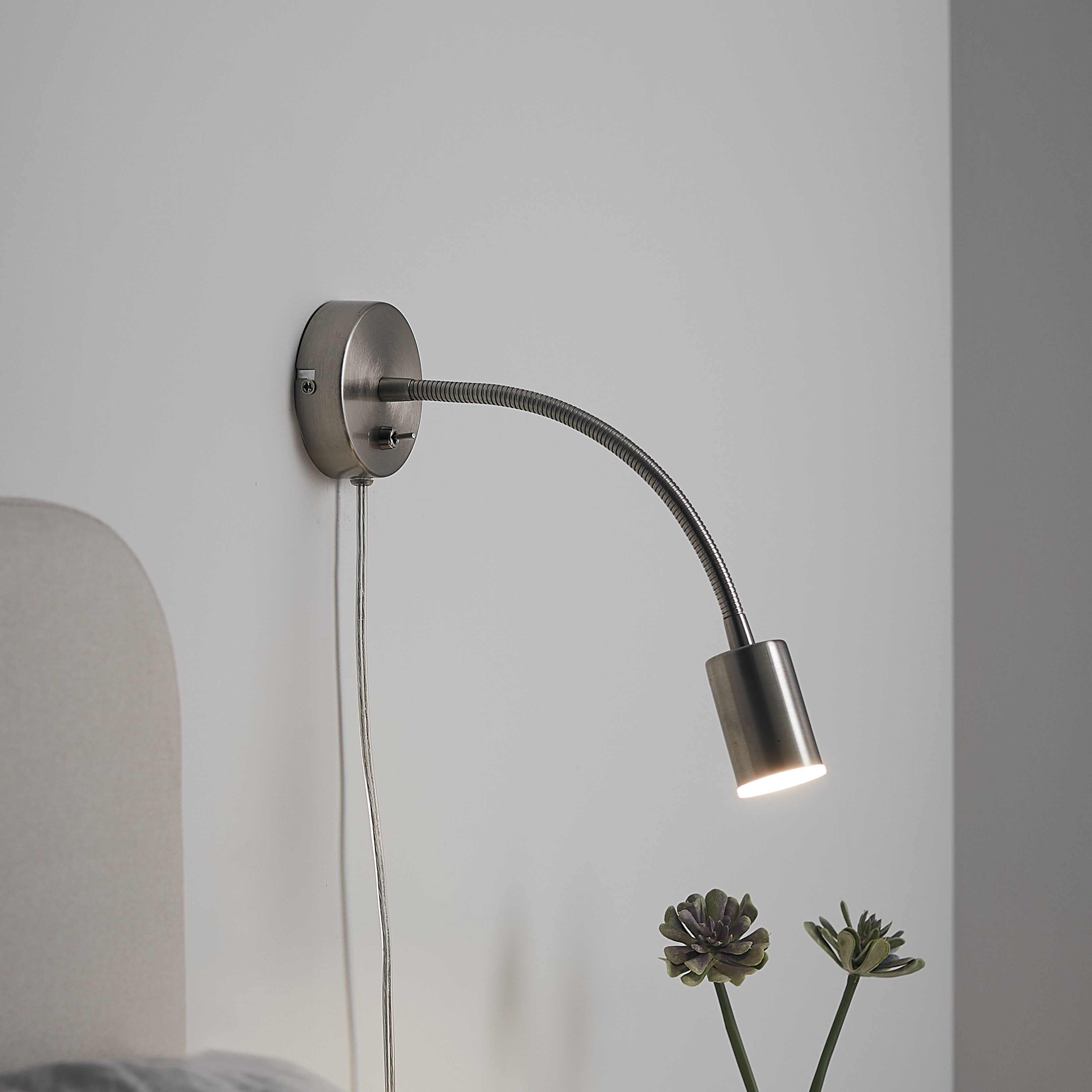 Chrome plug store in wall light