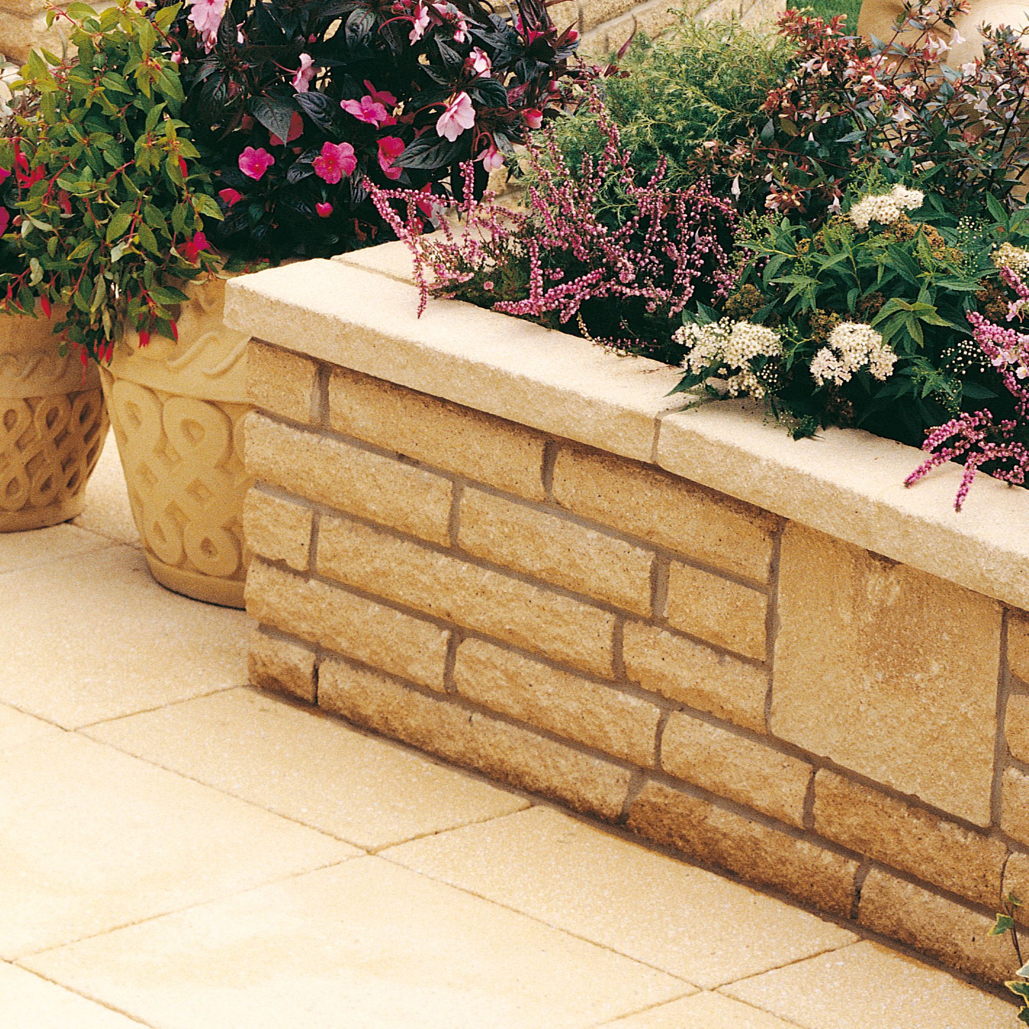 Pitched Buff Double Sided Walling Stone L 215mm H 63mm T 90mm Diy At B Q