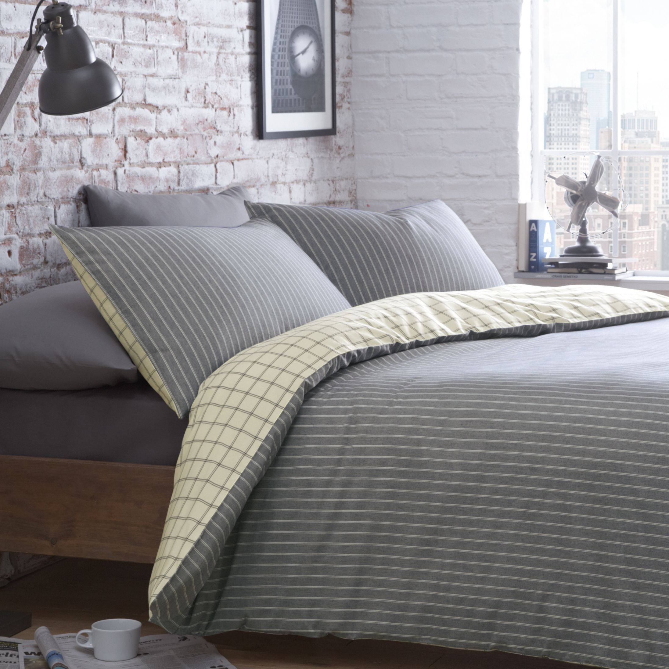 Cream colored bedding and trim with very light gray walls. racing green check striped cream grey double bedding set