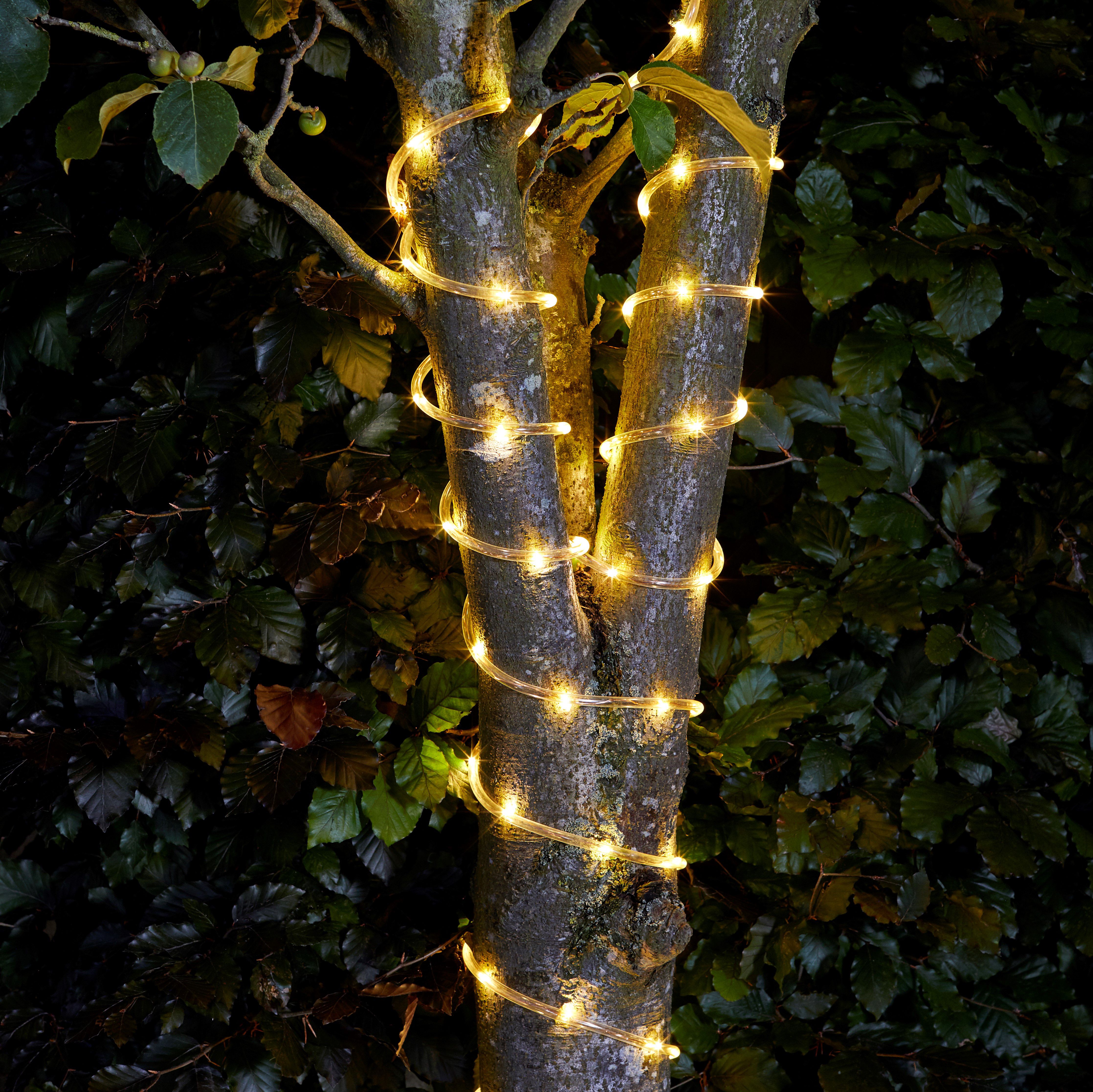 Solar power outlet tree lights