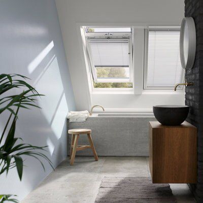 Velux White Timber Centre pivot Roof window, (H)780mm (W)550mm