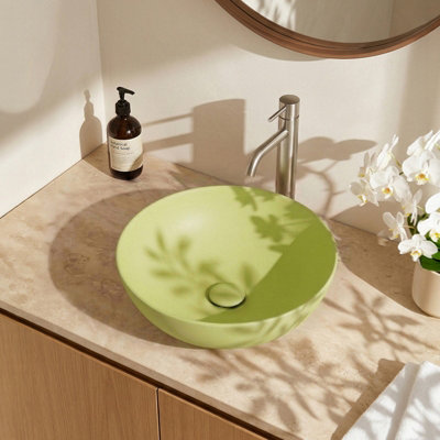 Living And Home Ceramic Countertop Washbasin With Waste SetGreen from B&Q