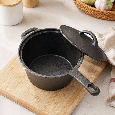 Living And Home 2.5L Black Pre-Seasoned Cast Iron Saucepan With Lid19Cm (W) X 31Cm (D) X 9.5Cm (H) from B&Q