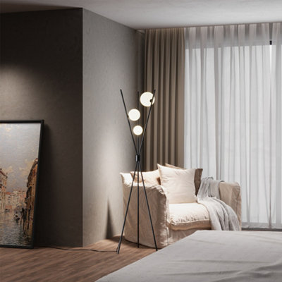 Living And Home Metal Tripod Standing Floor Lamp With Plastic Lampshade from B&Q