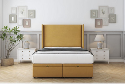 Sloomy Devonshire Mustard Plush Ottoman Bed Base With 54" Wingback Headboard 4'6 Double from B&Q