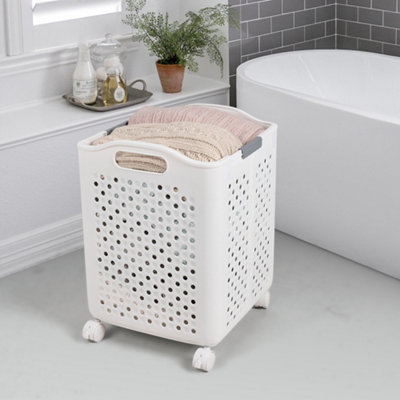 Living And Home White Foldable Laundry Basket With Wheels Collapsible Plastic Laundry Hamper from B&Q