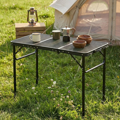 Living And Home Portable Height Adjustable Aluminium Camping Folding TableWith Carry Handle87Cm (W) X 40Cm (D) from B&Q