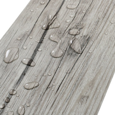 Darphe Rustic Light Grey Self Adhesive Wood Grain Effect Pvc Laminate Flooring Planks 5 Square Meters 36 Pieces from B&Q