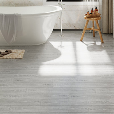 Darphe Grey Wood Grain Effect Peel And Stick Waterproof Self Adhesive Flooring Planks 5 Square Meters 36 Pieces from B&Q