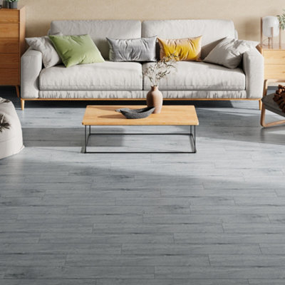 Darphe Self Adhesive Wood Grain Effect Pvc Flooring Planks Grey Peel And Stick Floor Tiles 5 Square Meters 36 Pieces from B&Q