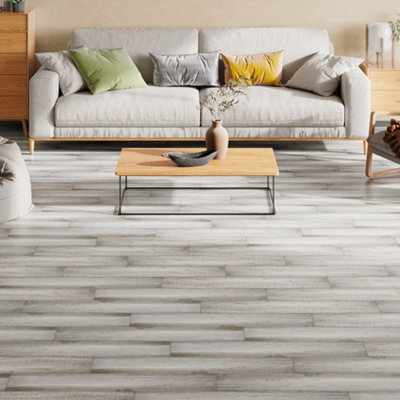Garden Sanctuary Natural Finish Wood Grain Effect Peel And Stick Floor Tiles 36Pcs 5M² from B&Q