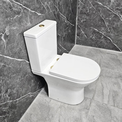 Hydros Melissa Toilet With Brushed Brass Flush Button & Hinges Rimless Soft Close Seat from B&Q