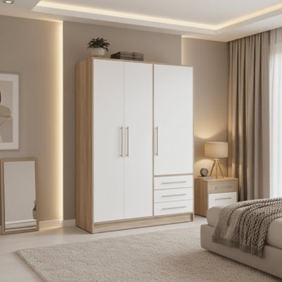 Amos Mann Furniture Essen 3 Door Wardrobe With Drawers White And Oak Effect from B&Q
