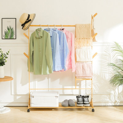 Darphe Freestanding Natural Bamboo Clothes Rack With Wheels And Bottom Shoe Shelf from B&Q