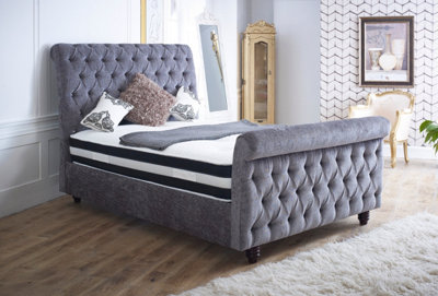 Stratus Interiors Montreal Chesterfield Upholstered Sleigh Bed FrameAdd Professional Assembly & Delivery- Small DoubleGas Lift Ottoman Storage from B&Q