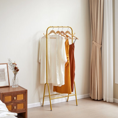 - Freestanding Gold Metal Hanging Garment Clothes Rack With Bottom Shelf And Hooks 147Cm (H)