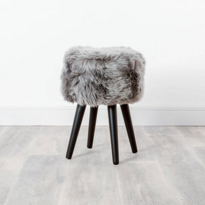 Native Natural Sheepskin Wood Stool With Black Legs from B&Q
