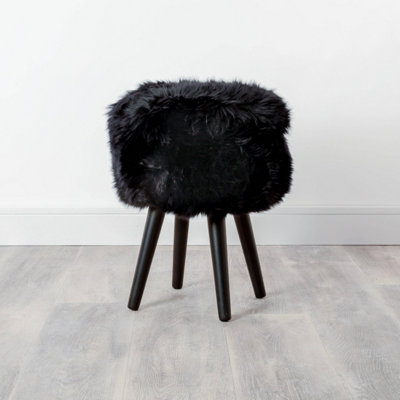 Native Natural Sheepskin Wood Stool With Black Legs from B&Q