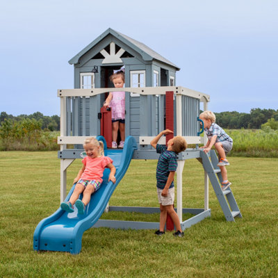 Backyard Discovery Beacon Heights Elevated Cedar Wooden Playhouse With Slide from B&Q