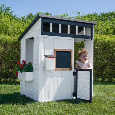 Backyard Discovery Caraway Cottage Cedar Wooden Kids Playhouse With Chalkboard And Play KitchenWhite from B&Q