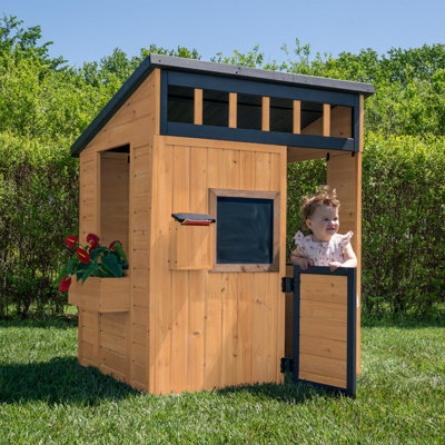 Backyard Discovery Caraway Cottage Cedar Wooden Kids Playhouse With Chalkboard And Play KitchenBrown from B&Q