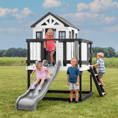 Backyard Discovery Sweetwater Heights Elevated Cedar Wooden Playhouse With Slide from B&Q