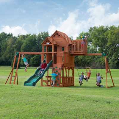 Backyard Discovery Skyfort Ii Cedar Wooden Climbing Frame With 2 X SwingsTrapezeMonkey Bars And Slide from B&Q