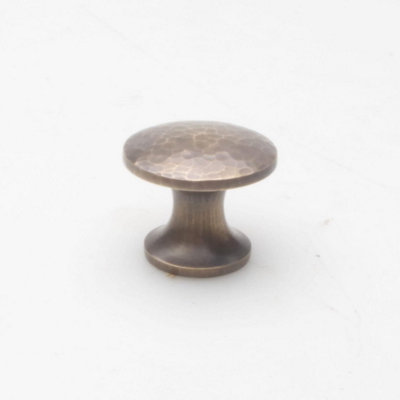 Castelion Antique Brass Hammered Cupboard Knob 32mm from B&Q