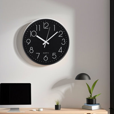 Living And Home 12 Inch Minimalist Wall Clock With Arabic Numerals Black from B&Q