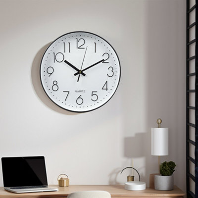 Living And Home 12 Inch Minimalist Wall Clock With Arabic Numerals White from B&Q