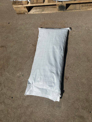 10 Filled white polyproplene sandbags - 1