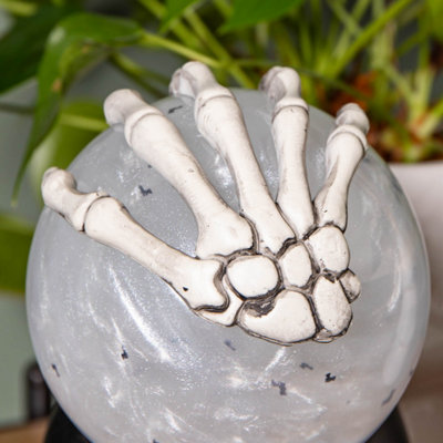 15cm Battery Operated Light up Grey Skeleton's Hand Water Globe