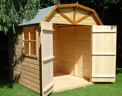A timber shed with a Dutch apex roof, where two sides meet at a point in the middle. The roof has two sloped sections leading to the center, providing more interior space.