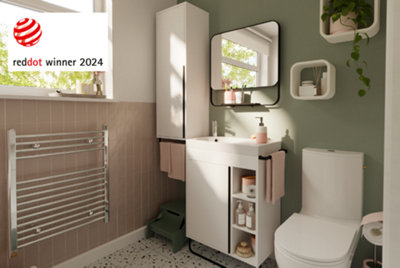 A green and pink bathroom with modern GoodHome fittings.