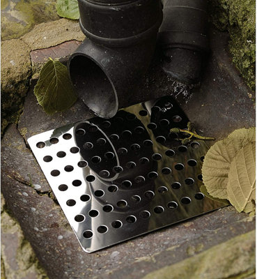 Square Outdoor Drain Cover Brick Surface Stock Photo