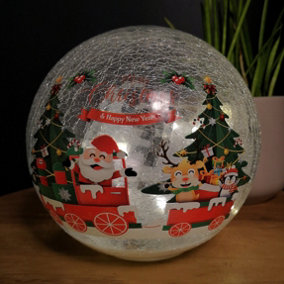 20cm Battery Operated Twinkling Warm White LED Crackle Effect Ball Christmas Decoration with Santa and Friends in Train