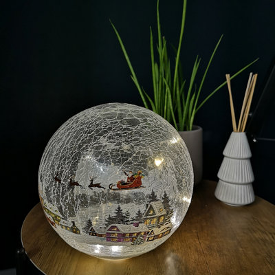 20cm Battery Operated Warm White LED Crackle Effect Ball Christmas Decoration with Village Scene