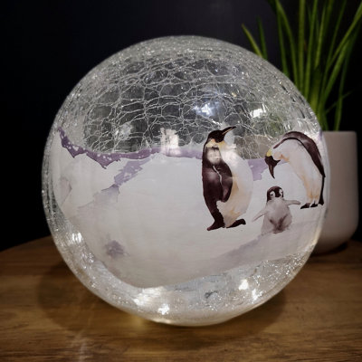 20cm Festive Christmas LED Crackle Effect Glass Penguin Scene Ball