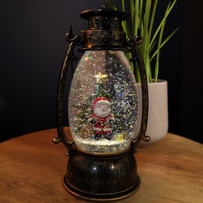 24cm LED Christmas Glitter Water Spinner Antique Lantern Snowy Santa Scene