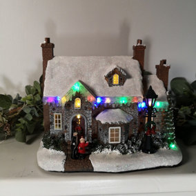 27cm Light Up Multi Coloured Christmas House Scene With Lamp Battery Operated